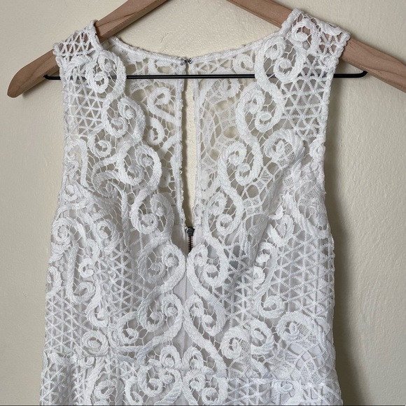 BCBGMAXAZRIA Sleeveless Lace Peplum Top - Picture 2 of 7